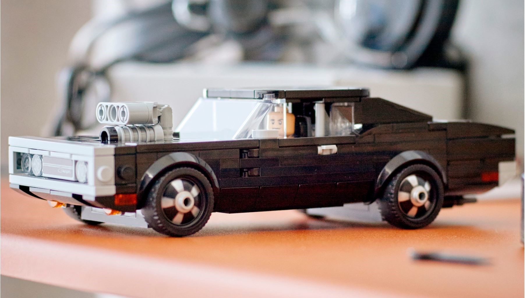 Six LEGO vehicles that have been redesigned in a different scale